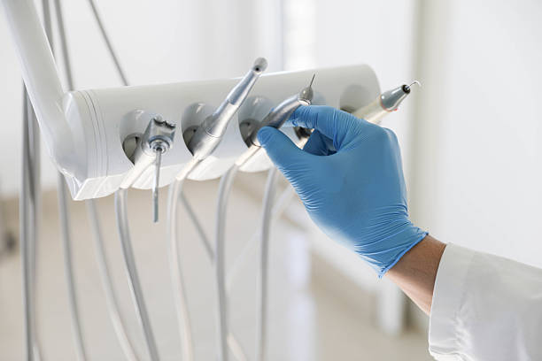 Professional Tooth Extraction technician working in Greenville, MI